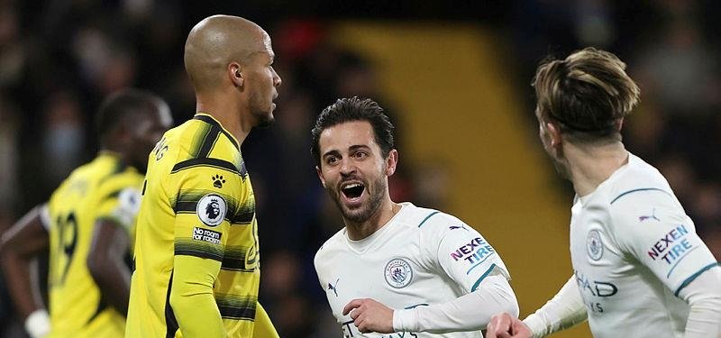 Manchester City take top spot after comfortable win at Watford