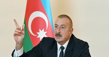 Ilham Aliyev: Azerbaijan raises flag on historic bridge