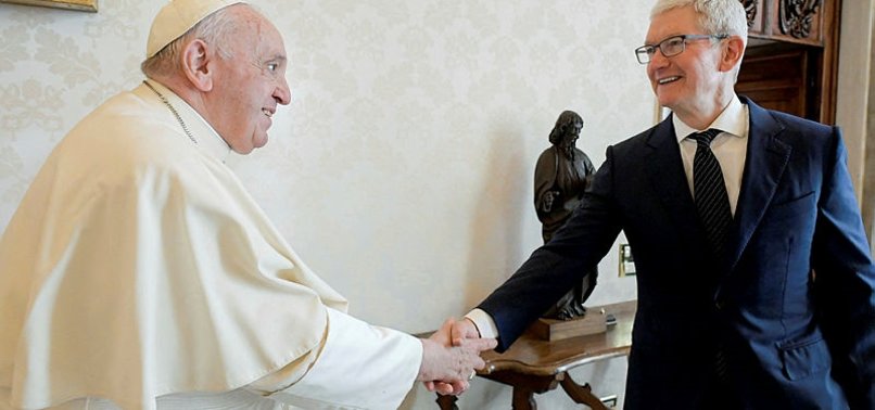 MOBILE PHONE CRITIC POPE FRANCIS MEETS APPLE CHIEF TIM COOK