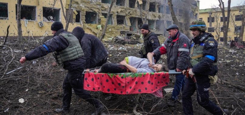 MARIUPOL OFFICIAL: DOZENS OF BODIES REMOVED