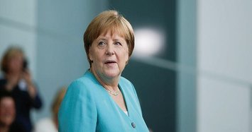 Future of Merkel's govt in hands of crisis-hit SPD
