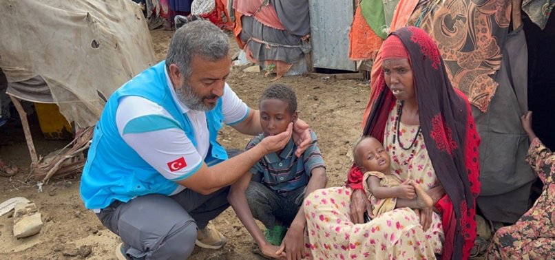 TURKISH CHARITY DISTRIBUTES AID TO SOMALIS STRUGGLING WITH FAMINE