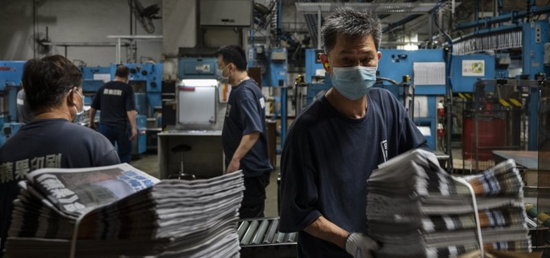 Pro-democracy Hong Kong newspaper Apple Daily to shut down Thursday
