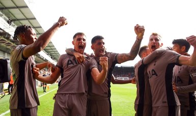 Ten-man Spurs top Premier League as Van de Ven sinks Luton