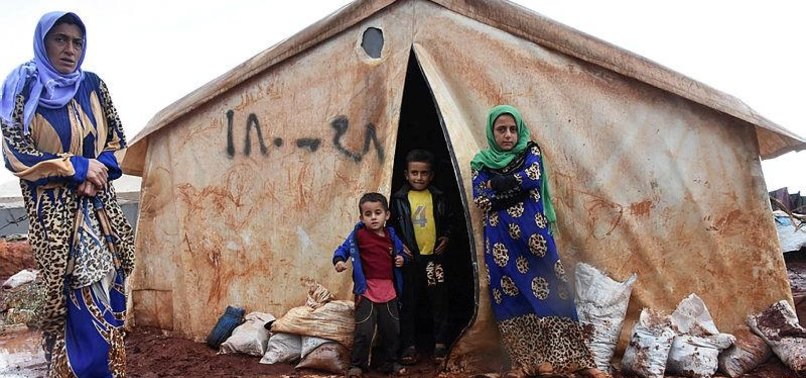 REFUGEES IN SYRIA’S IDLIB STRUGGLE WITH RAINS, FLOODING