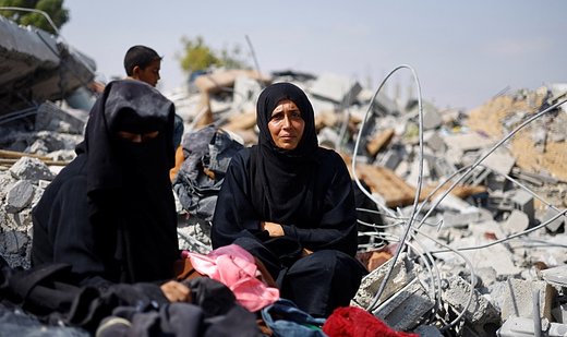 Palestinian sisters cry out for missing mother after airstrike