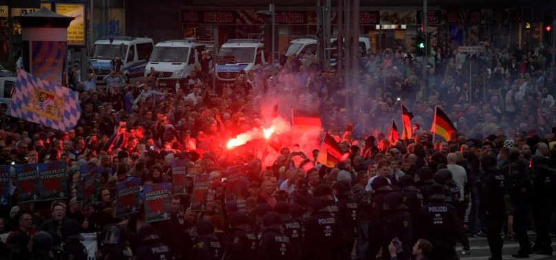 POLICE UNDER FIRE AFTER GERMANY FAR-RIGHT MOB VIOLENCE