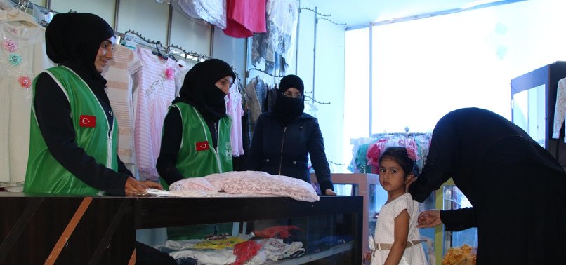 TURKISH NGO PROVIDES CLOTHING TO NEEDY SYRIAN FAMILIES