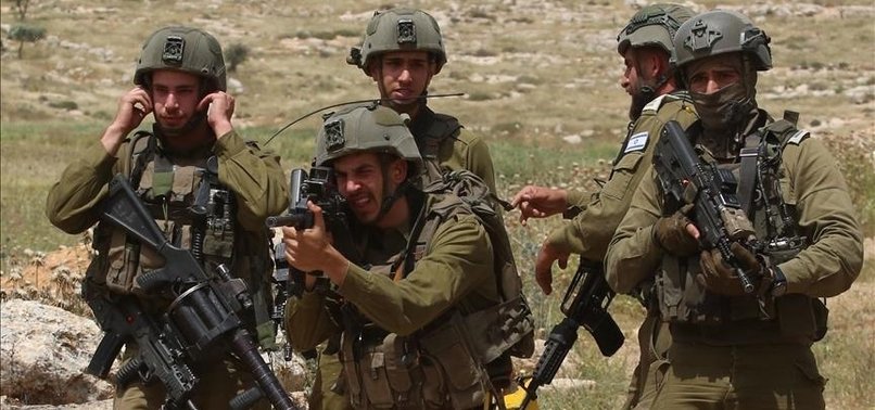 ISRAELI TROOPS KILL YOUNG PALESTINIAN IN OCCUPIED WEST BANK