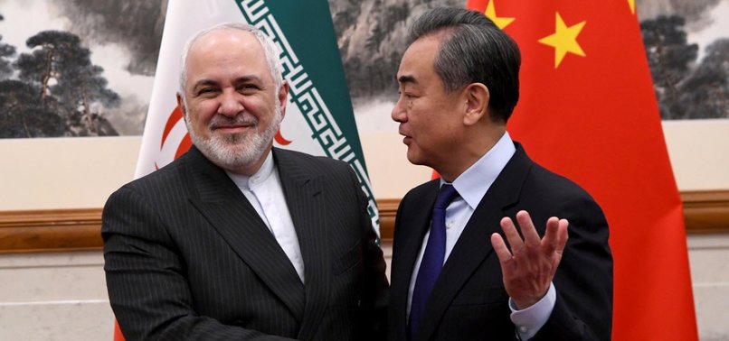 CHINA, IRAN MINISTERS MEET, CRITICIZE BULLYING PRACTICES