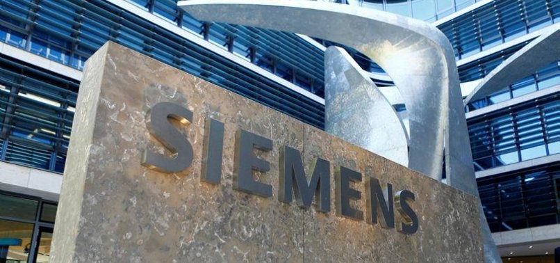 GERMANY WARNS RUSSIA OF STRAINING TIES OVER SIEMENS SCANDAL, REPORT SAYS