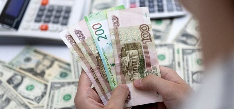 RUSSIAN ROUBLE HOVERS NEAR 90 VS DOLLAR