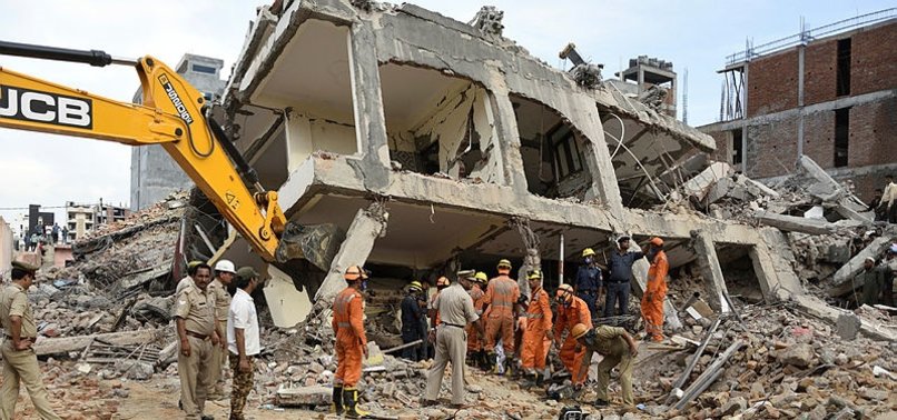 INDIAN BUILDING COLLAPSE KILLS FIVE, MORE FEARED TRAPPED