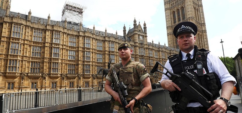 BRITISH POLICE ARREST MAN WITH KNIFE OUTSIDE UK PARLIAMENT