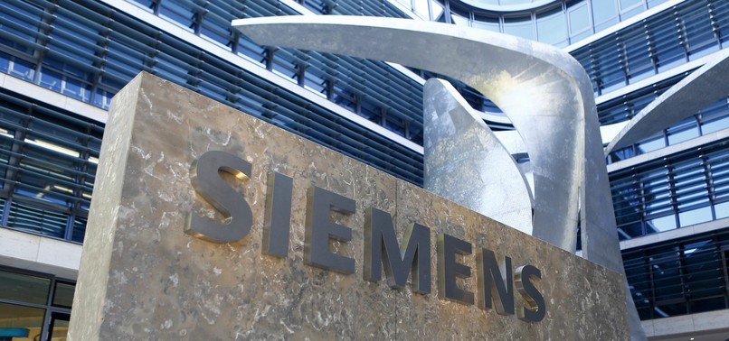 IRAQ SIGNS MEMORANDUMS WITH SIEMENS AND GE