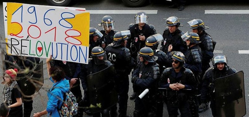 POLICE RAID FRENCH UNIVERSITY AS ANTI-MACRON PROTESTS FLAG