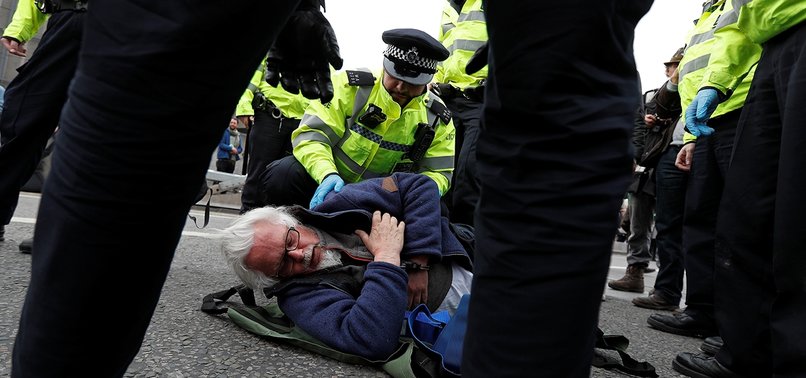 BRITISH POLICE ARREST MORE THAN 200 CLIMATE CHANGE PROTESTERS IN LONDON