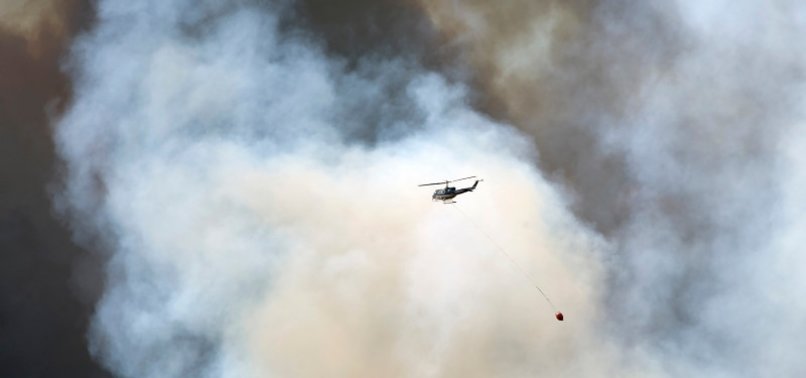HELICOPTER CRASHES, PILOT DIES FIGHTING WILDFIRE IN CANADA