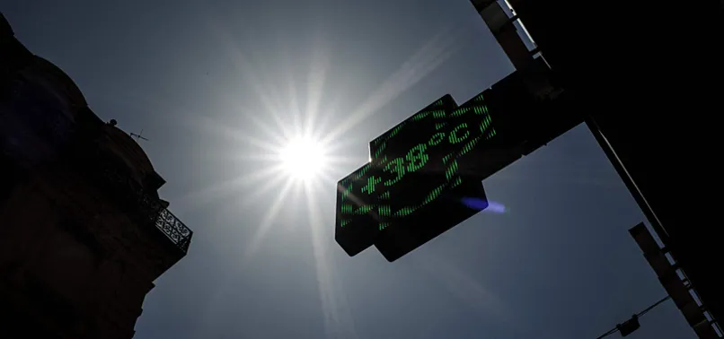 CROWDS RUSH TO BUY AIR CONDITIONERS AT FRENCH SUPERMARKET AMID HEAT WAVE