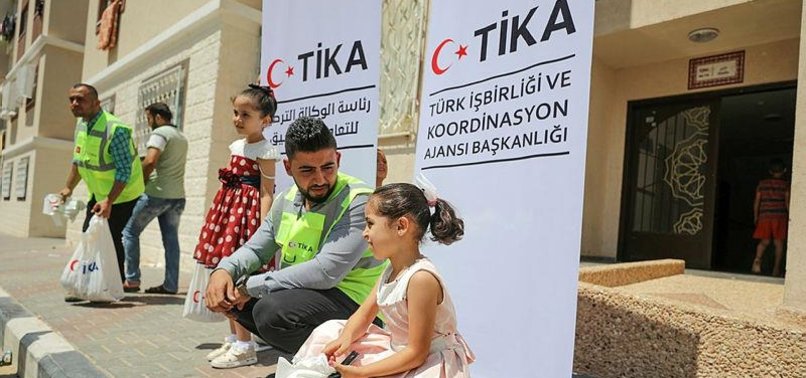 TURKISH VOLUNTEERS DISTRIBUTE EID MEAT TO GAZA FAMILIES