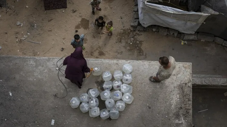Displaced Gaza families struggle in tents near damaged Islamic University