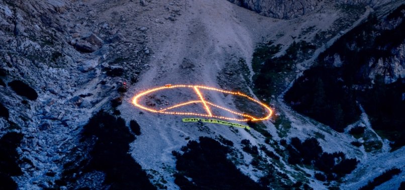 GREENPEACE PROJECTS CLIMATE MESSAGE ONTO MOUNTAIN NEAR G7 VENUE