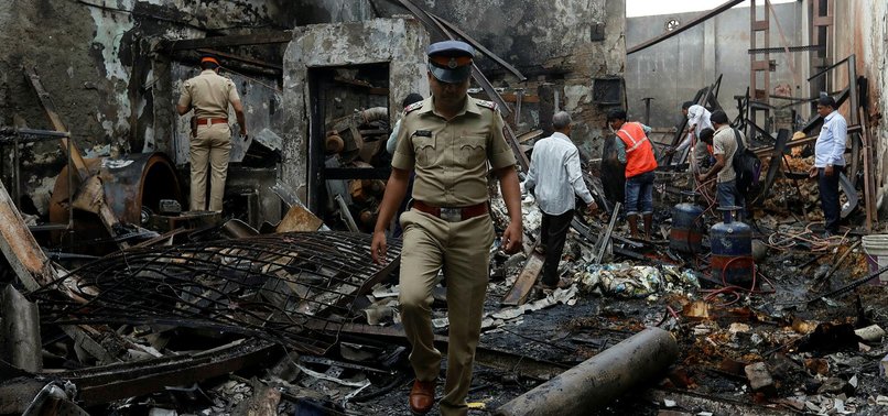 FIRE AND COLLAPSE IN MUMBAI SHOP KILLS 12