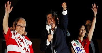 Shinzo Abe's ruling coalition secures upper house majority