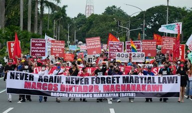 Philippine protesters vow to 'never forget' Marcos era abuses