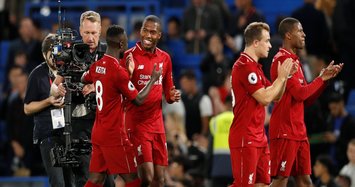 Sturridge salvages point at Chelsea to keep Liverpool unbeaten in league