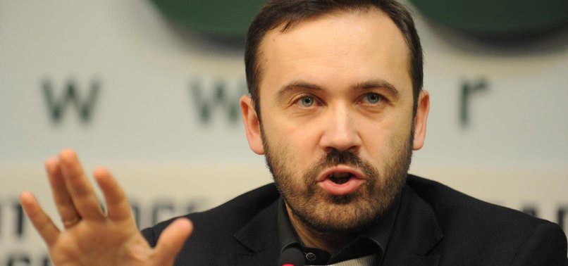 RUSSIAN EX-LAWMAKER ILYA PONOMARYOV CHARGED WITH SPREADING LIES ABOUT ARMY