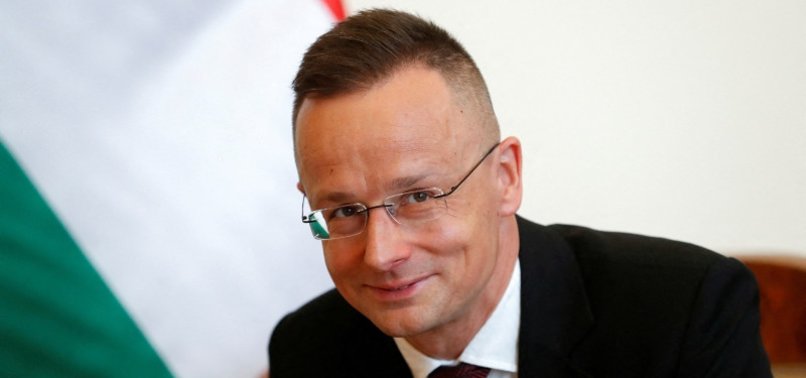 HUNGARIAN FOREIGN MINISTER VISITS UKRAINE BEFORE EU SUMMIT ON AID PACKAGE