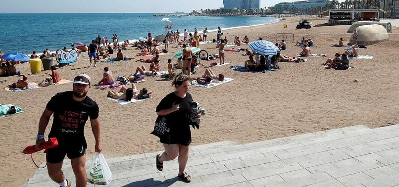 BARCELONA POLICE CLEAR BEACH AMID REPORT OF EXPLOSIVE DEVICE