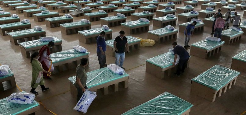 INDIA TURNS TO CARDBOARD BEDS IN CORONAVIRUS BATTLE