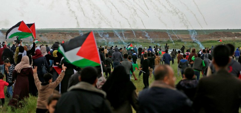 DOZENS OF PALESTINIAN PROTESTERS MARTYRED BY ISRAELI GUNFIRE IN LAND DAY PROTESTS