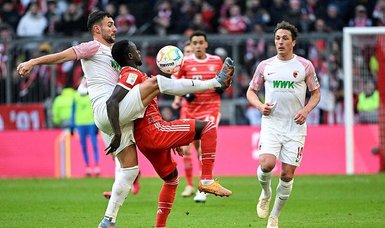 Bayern cruise past Augsburg 5-3 to open up lead in Bundesliga