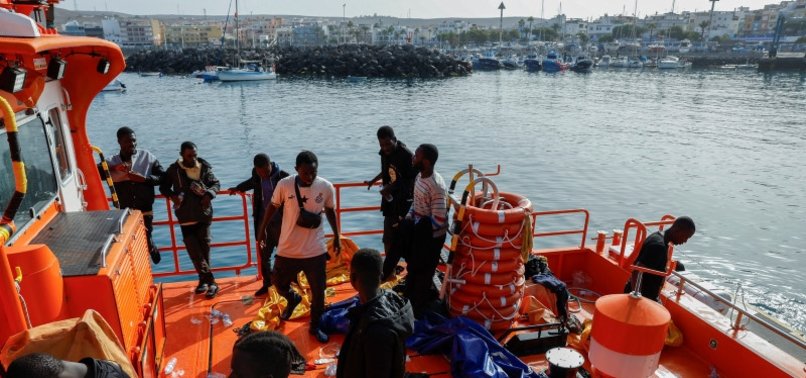 BOAT CARRYING NEARLY 300 MIGRANTS ARRIVES IN SPAINS CANARY ISLANDS: RESCUERS