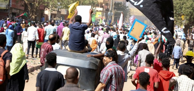 THOUSANDS OF SUDANESE DEFY TEAR GAS TO MARCH AGAINST COUP