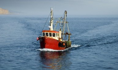 France fines British boats as fishing dispute escalates