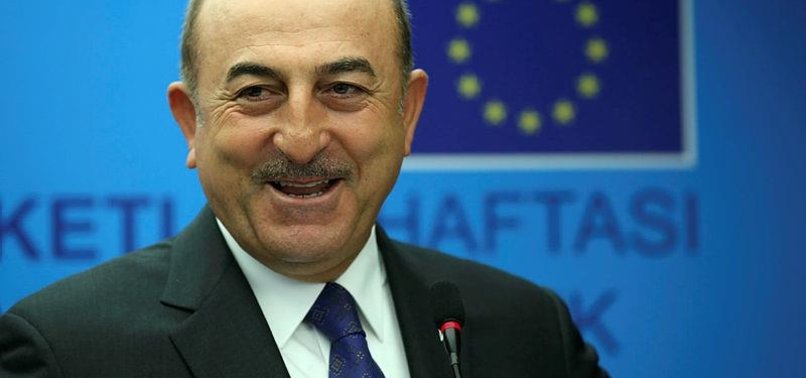 TURKEY CALLS ON EU TO OVERCOME OBSTACLES TOGETHER