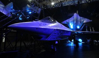 Russia unveils new fighter, Putin hails country's air power
