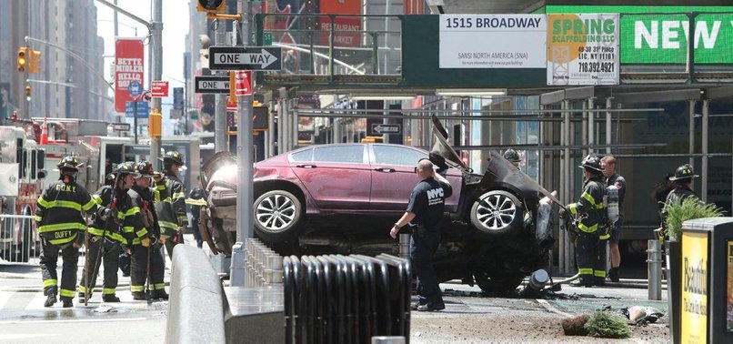 CAR STRIKES PEDESTRIANS IN NEW YORKS TIMES SQUARE