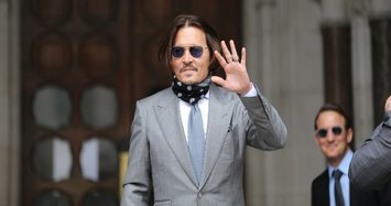 Actor Johnny Depp was punched by ex-wife Heard, UK court told