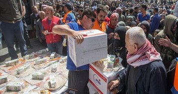 Turkey's AFAD hands out humanitarian aid in Syria's terror-free region