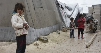 Displaced Syrians wary of coronavirus risk return to war-torn Idlib