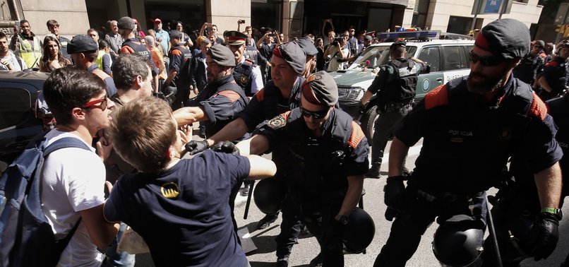 ANGRY PROTESTS IN BARCELONA AS POLICE DETAIN CATALAN OFFICIALS