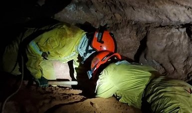 1 firefighter dead as rescuers race to reach 8 still in Brazil cave