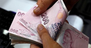 Turkey lowers withholding tax rates on lira deposits