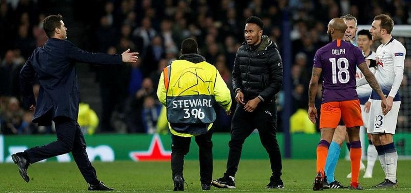 UEFA CHARGES TOTTENHAM OVER CHAMPIONS LEAGUE PITCH INVASION