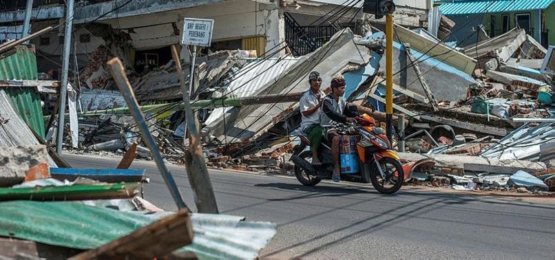 INDONESIAN ISLAND HIT BY ANOTHER QUAKE, CAUSING LANDSLIDES